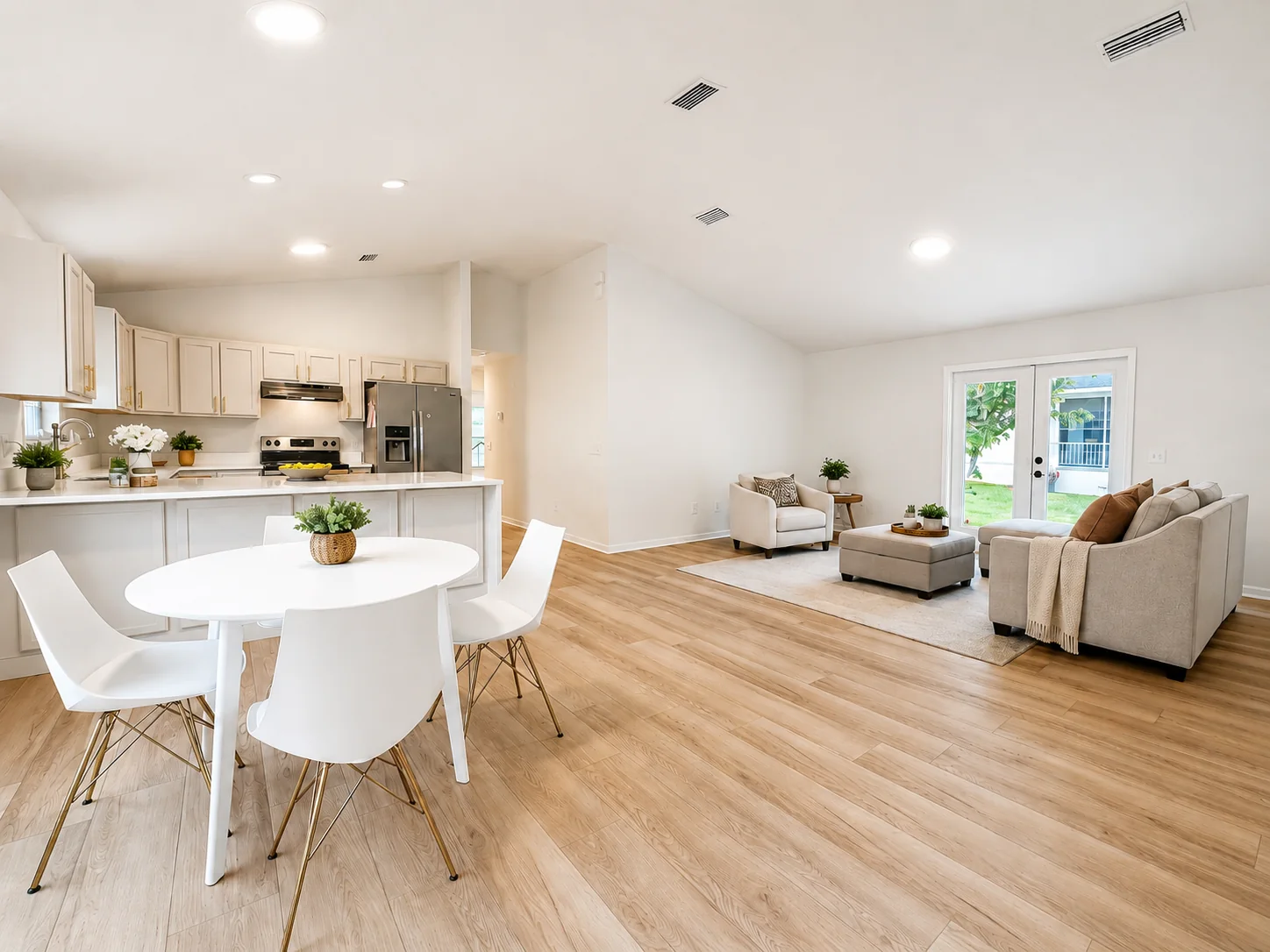Open-concept kitchen, dining, and living space